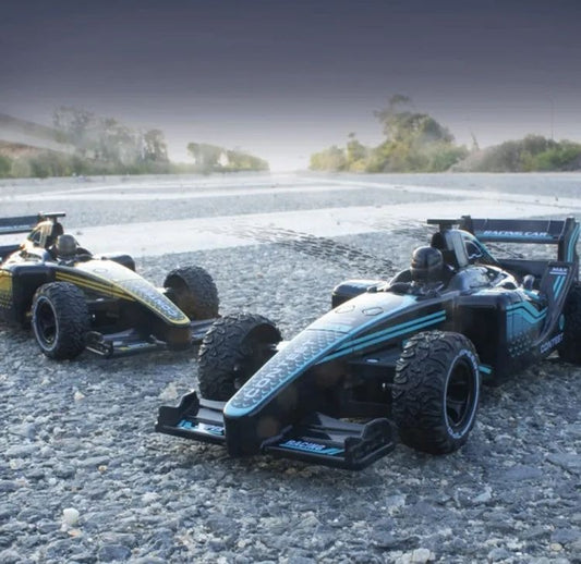 F1 Remote Control Formula Car Mini High-Speed F1 RC Racing Car For Kids F1 RC Rechargeable Moving Racing Lasting 2.4G High Speed Drift Sports Car For Boys Kids Toys Comes in Two Color Variation Best AMAZING RC Car For Gifts 4 Channel RC With Long Range